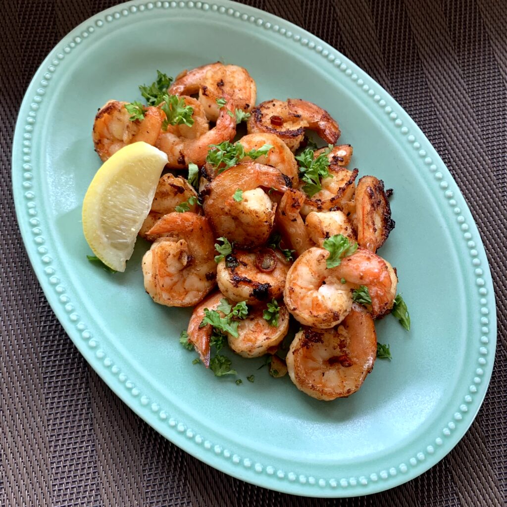A fragrant grilled shrimp marinated in a garlic and lemon sauce.