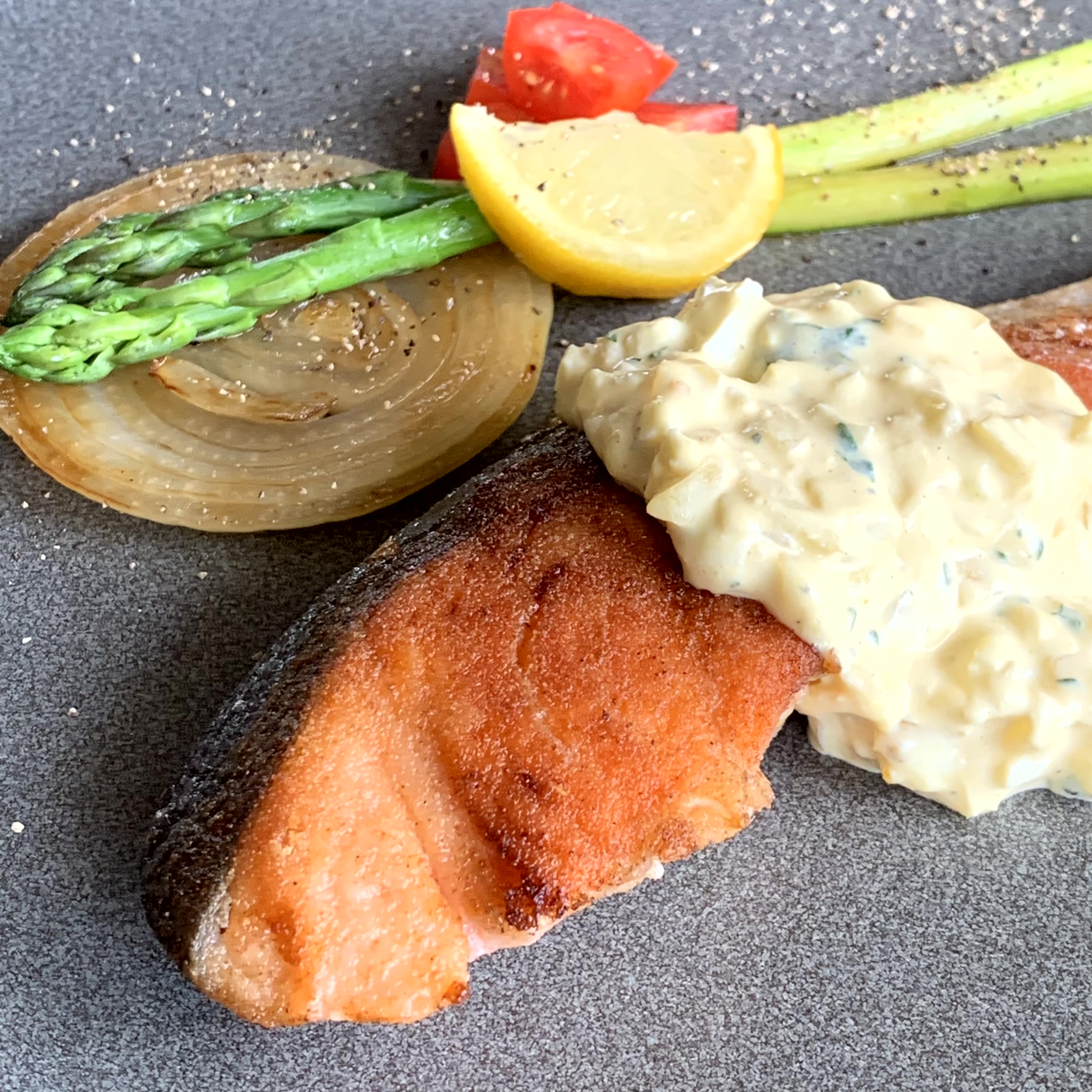 Coho salmon is coated with flour and baked in butter. 