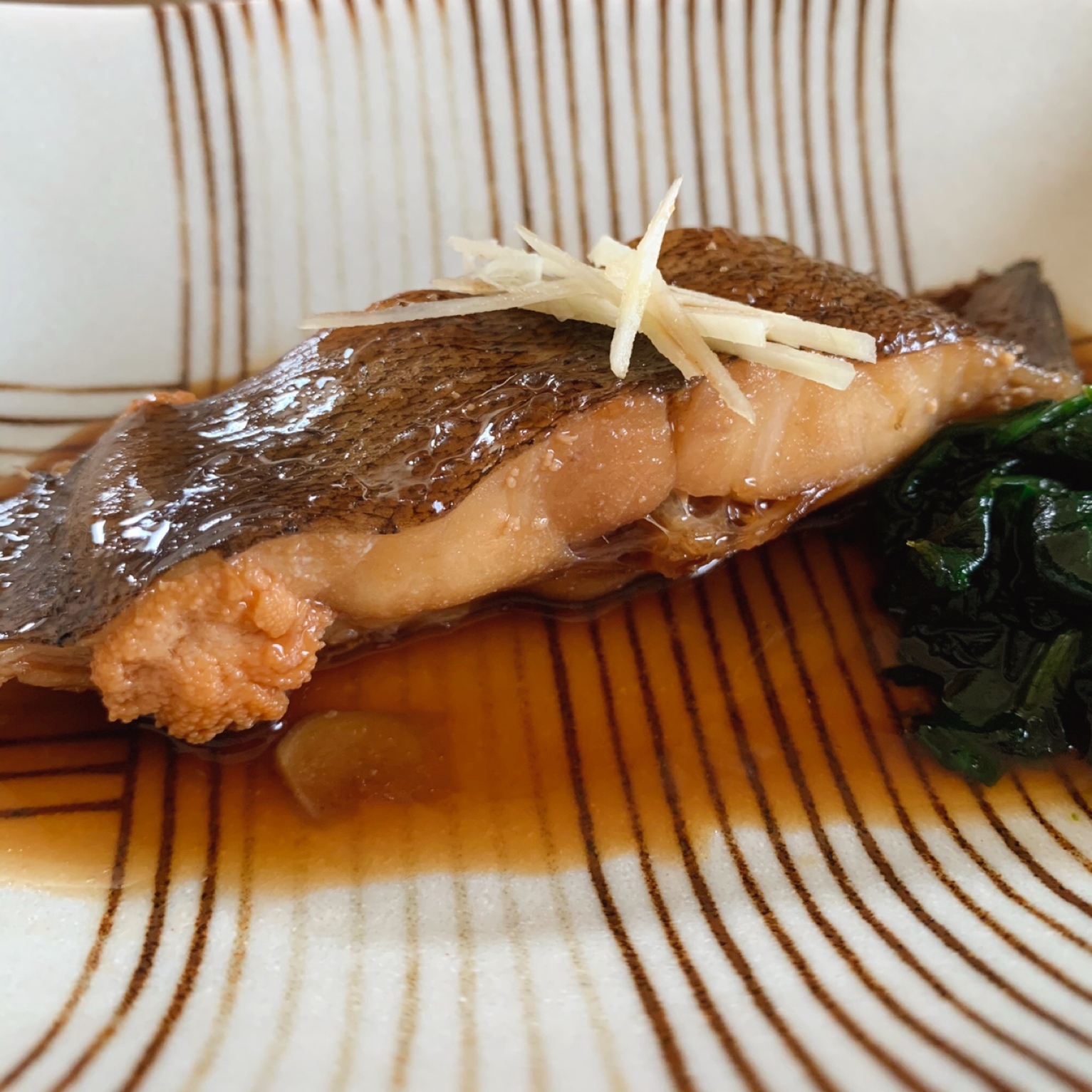 One of the representative Japanese dishes, righteye flounder is simmered in soy sauce and sugar. 