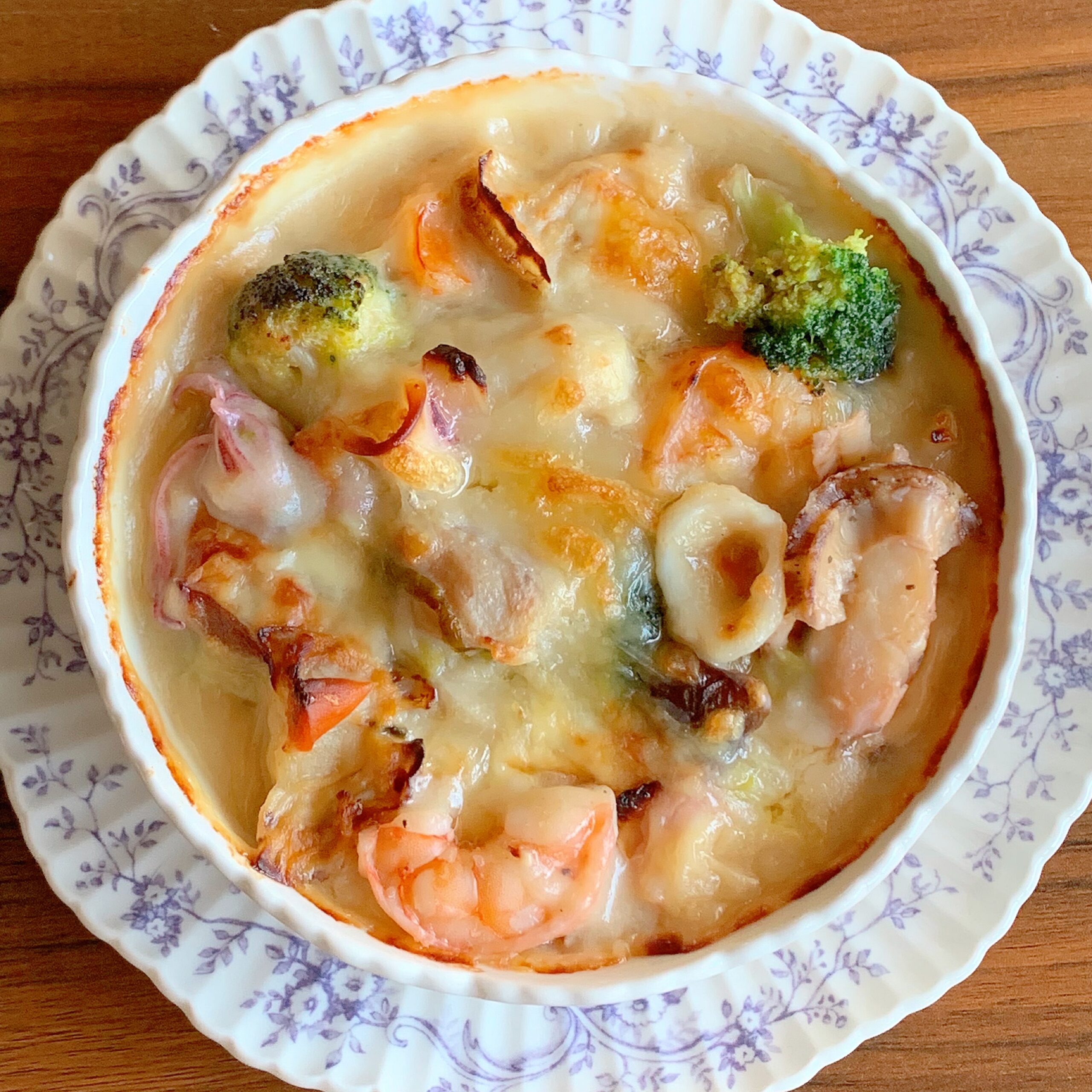 Gratin of winter vegetables and seafood