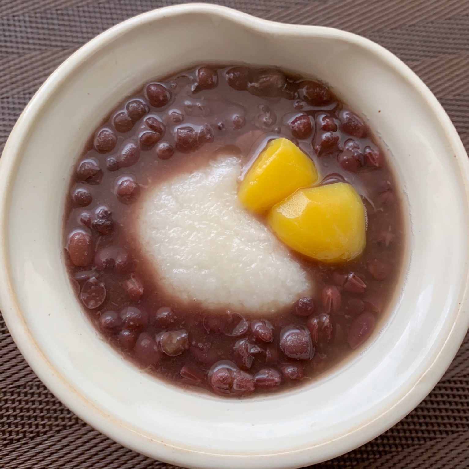 Zenzai is a dessert made with azuki(red beans), sugar, and mochi(rice cake).