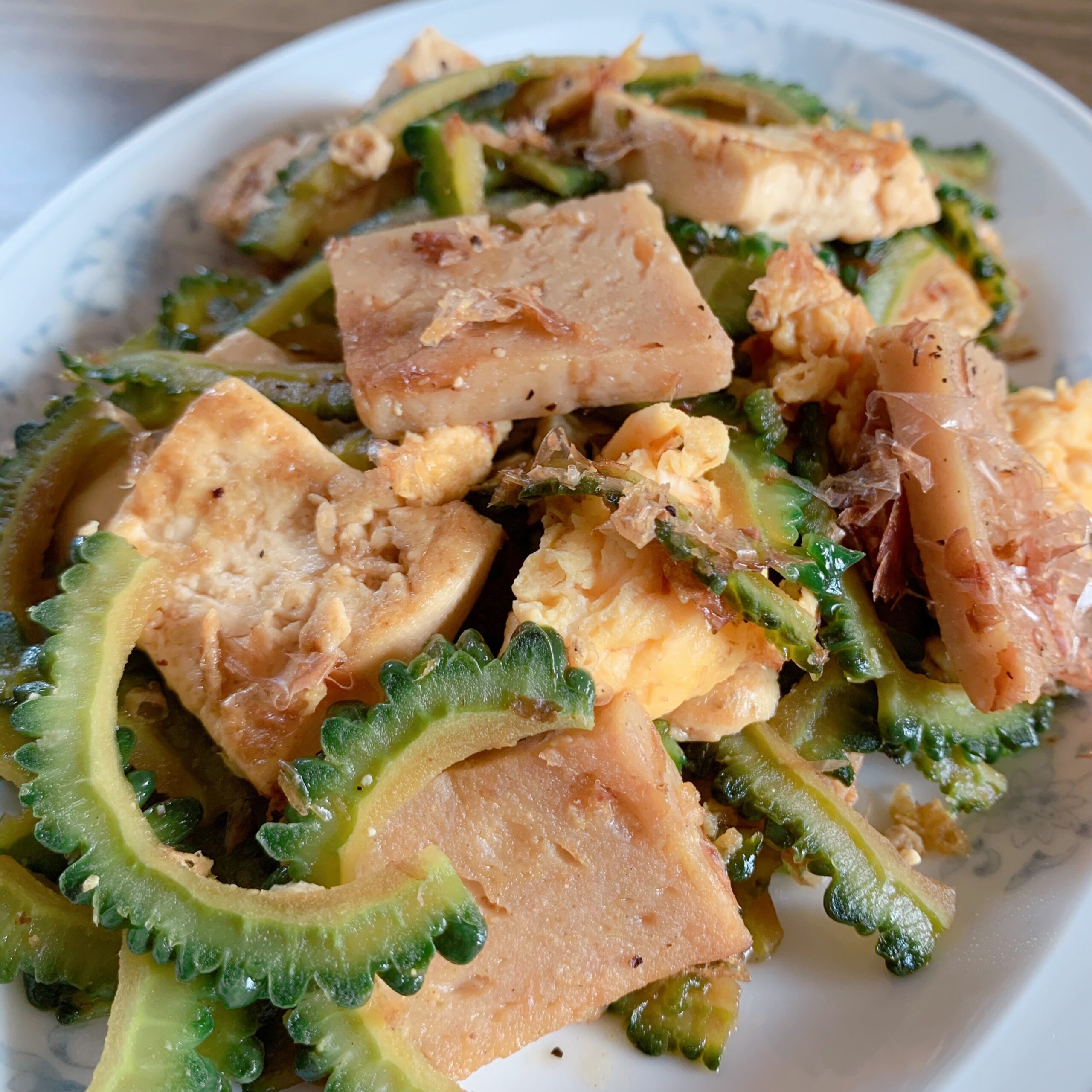 A dish originating in Okinawa that uses goya, tofu, spam, and eggs. 