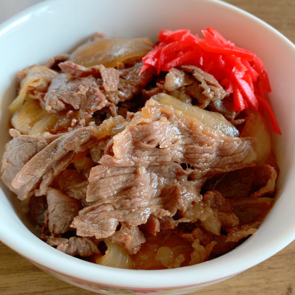 Gyudon is a dish of beef and onions simmered in soy sauce and served on rice. 