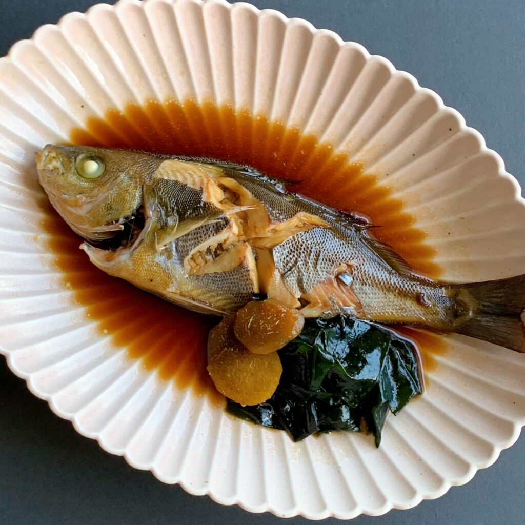 A dish of isaki (chicken grunt) simmered in soy sauce.