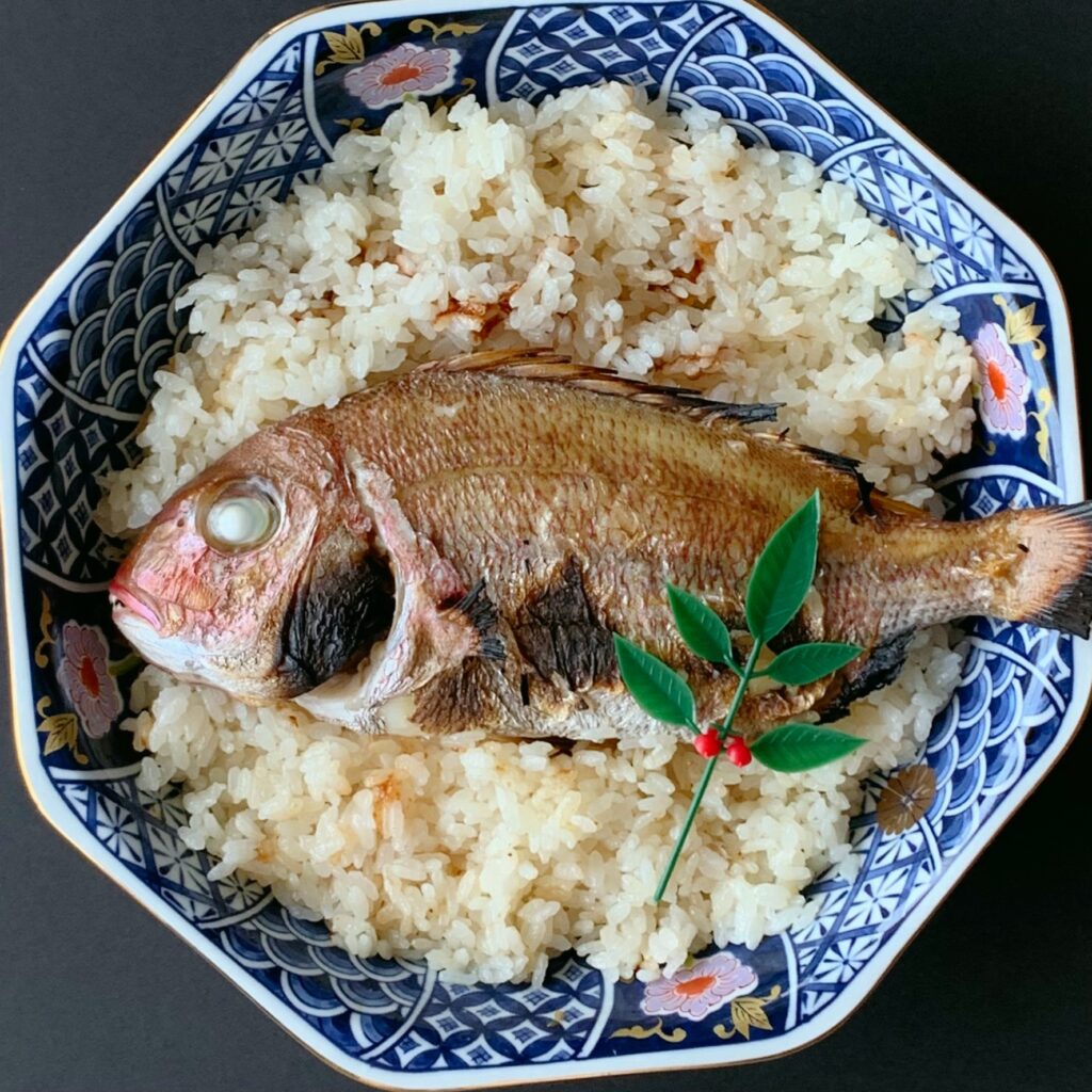 Taimeshi is rice cooked with grilled sea bream on top.