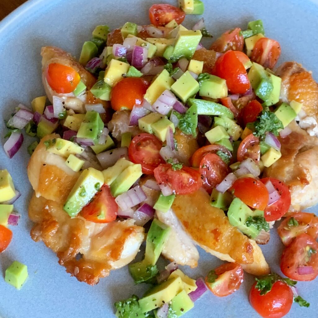 Savory grilled chicken thighs topped with a spicy yet refreshing salsa sauce. 