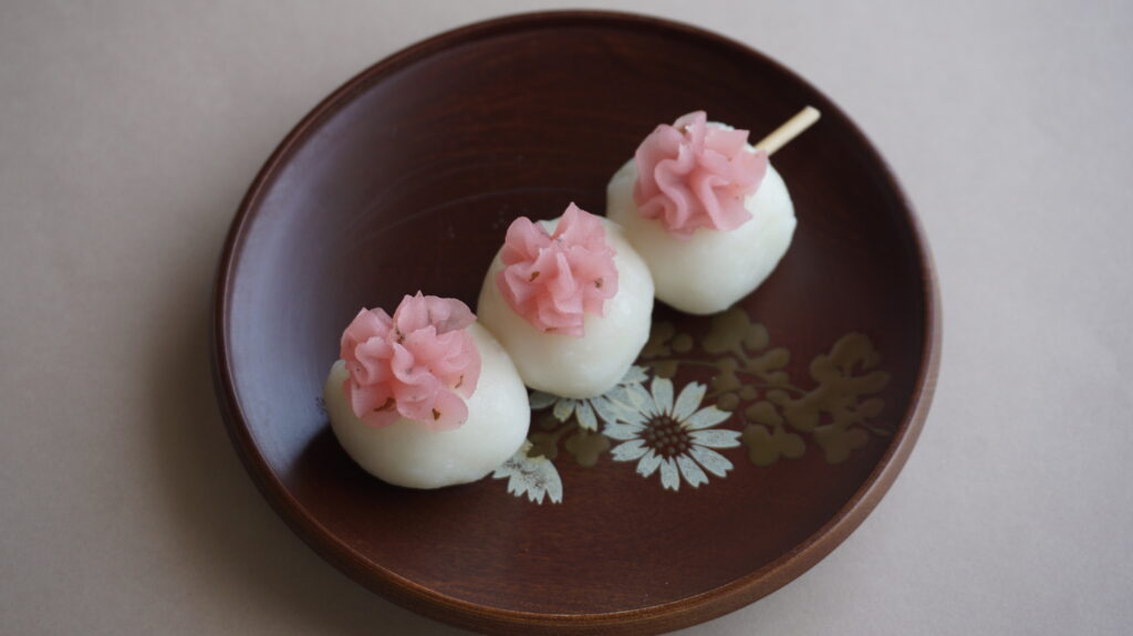 Dango topped with Sakura Cherry Blossom An Paste