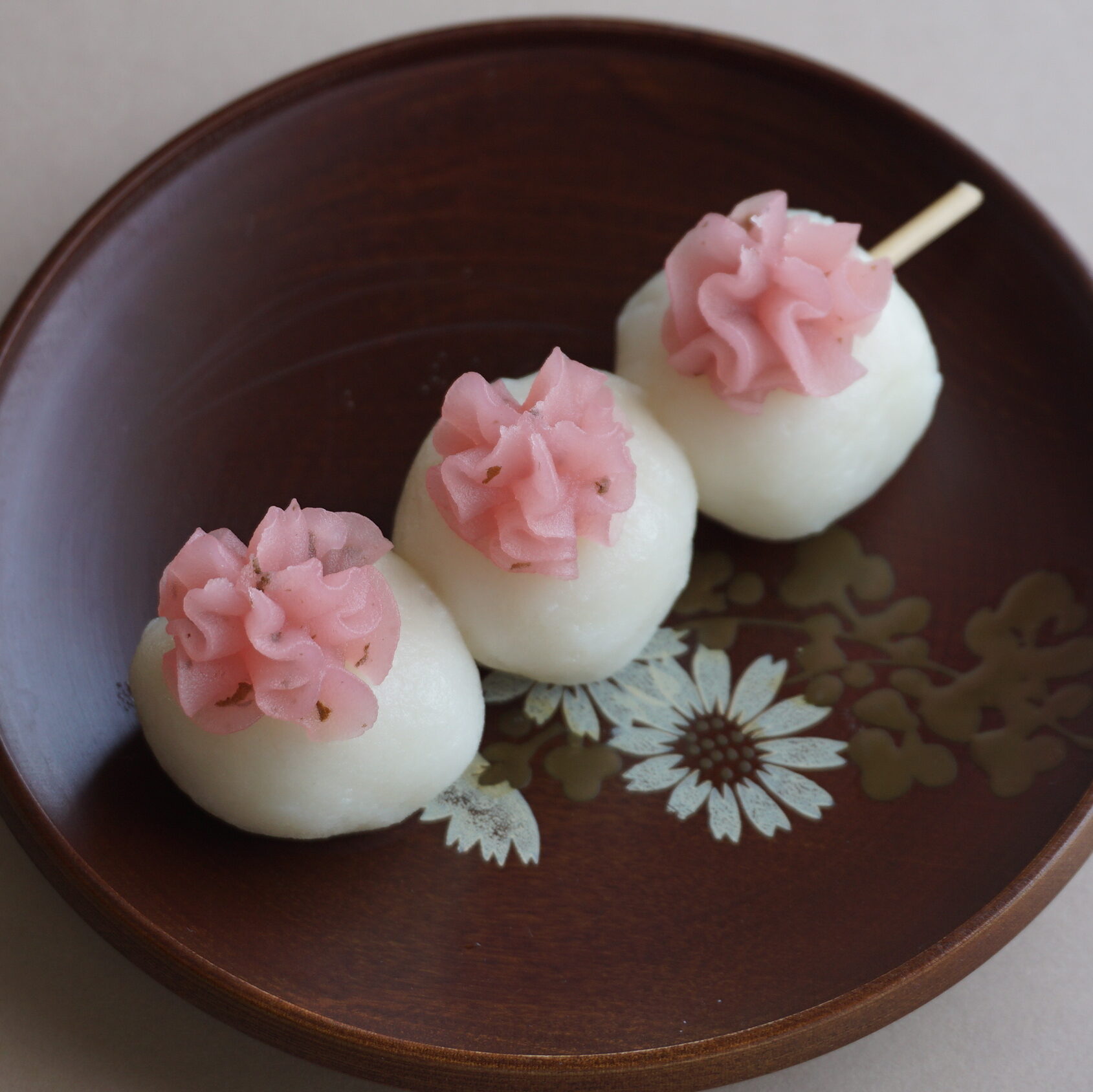 Dango topped with Sakura Cherry Blossom An Paste